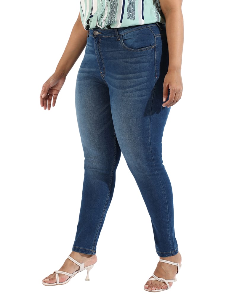 Front of a model wearing a size 38 Women Mid Wash Skinny Fit Denim Jeans in Navy by Instafab Plus. | dia_product_style_image_id:294359